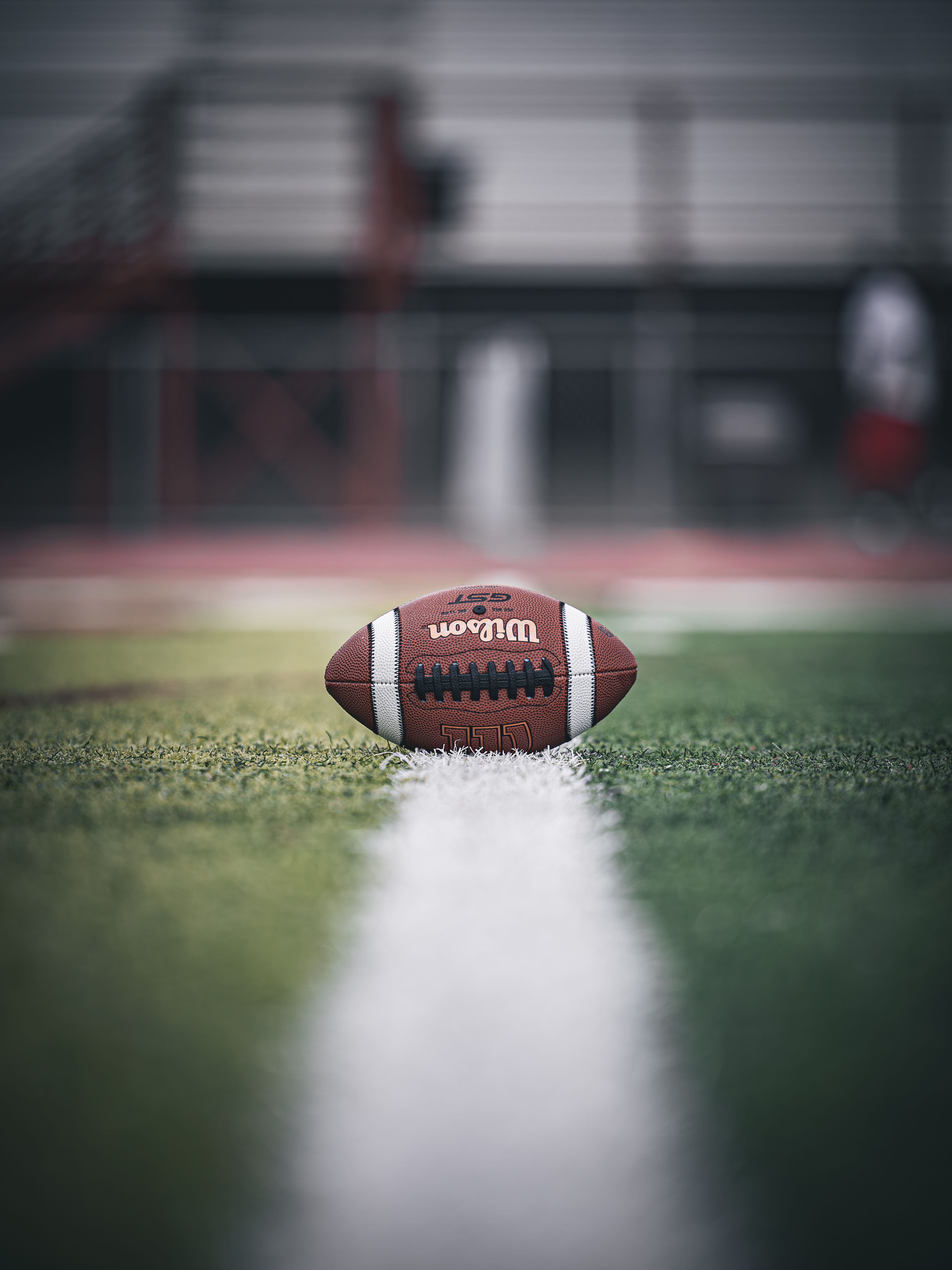 Football centered on a marked field